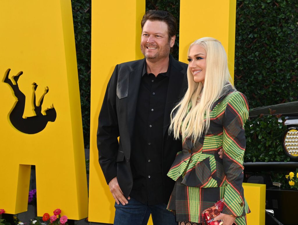 Blake Shelton Had To Record This TV Theme Song  - Blake wearing black and his wife Gwen Stefani at the Hollywood Fall Guy movie premiere a week ago (4/30).