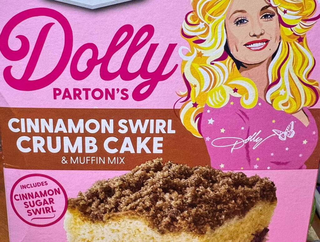 A box of Dolly Parton's Cinnamon Crumb Cake Mix from Ducan Hines. 